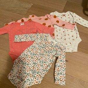 Four-Piece Child of Mine by Carters Tops.